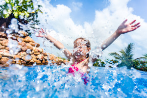 little girl splashing at dollywood splash country in Pigeon Forge