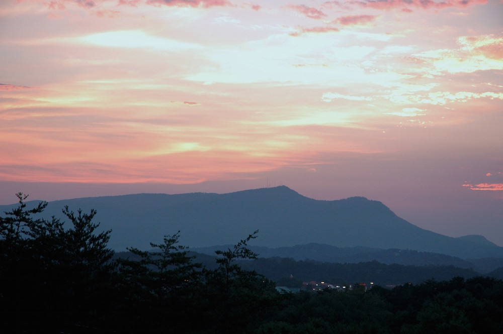 Sunset in Pigeon Forge over mountains