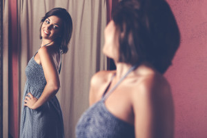 woman trying on clothes while Pigeon Forge shopping
